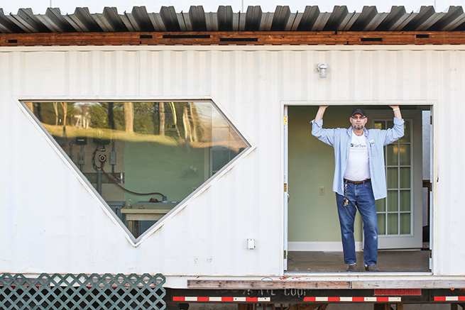 D.I. von Briesen standing in the Ecobox Doorway - from article by Greg Lacour, Photo by Logan Cyrus